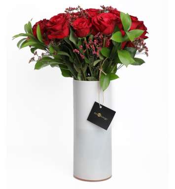 Bunch Of Red Roses In a Big Long Vase